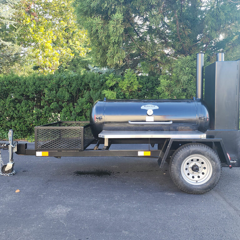 Used Meadow Creek TS120 Tank Smoker With Live Smoke, Insulated Firebox, Stainless Steel Exterior Shelves & Extra Grate in Warming Box